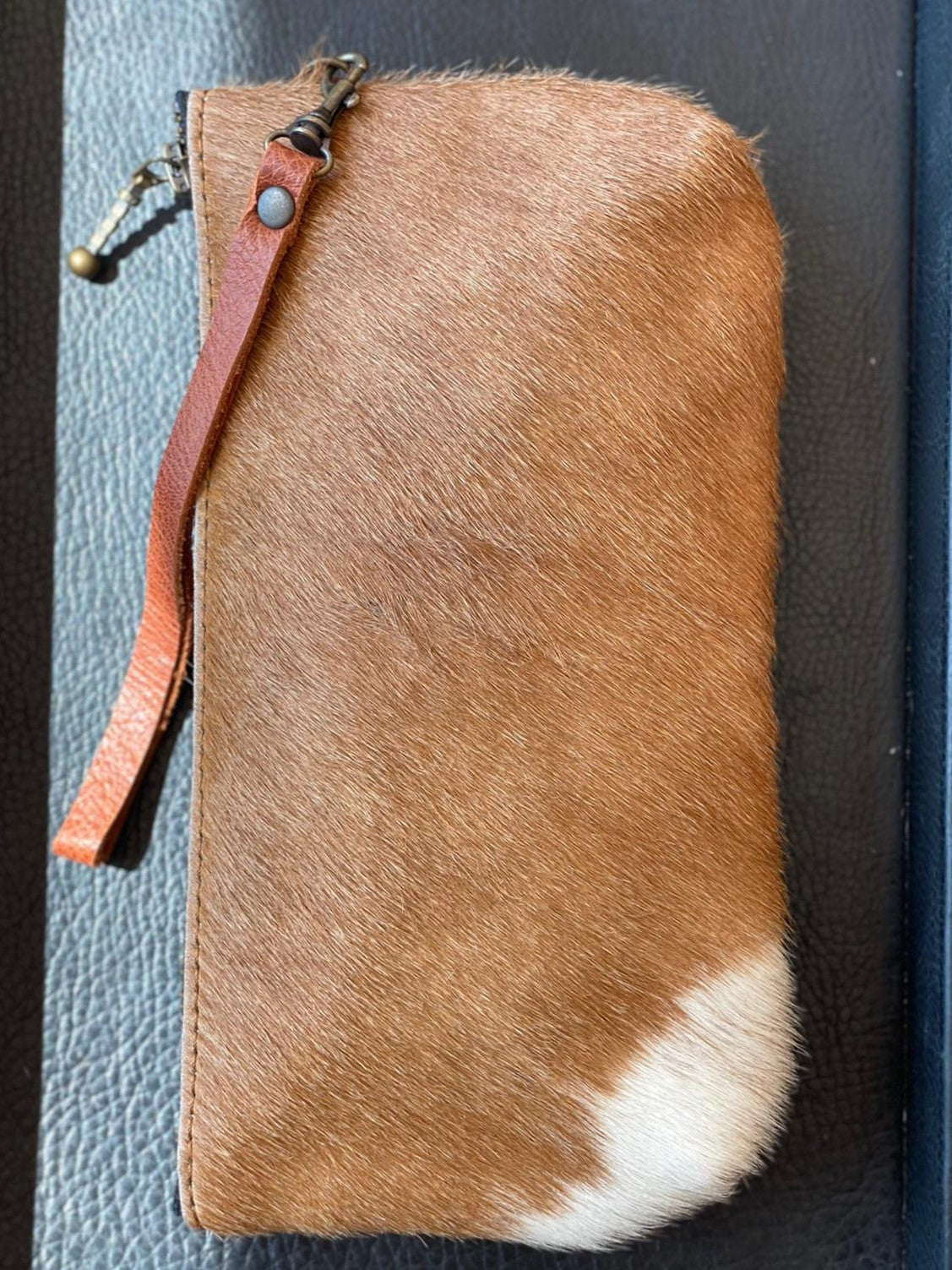 The Campeche Cowhide Clutch